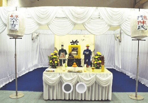 Elaborate Taoist funeral wake at HDB void deck managed by Ang Chin Moh Funeral Directors.