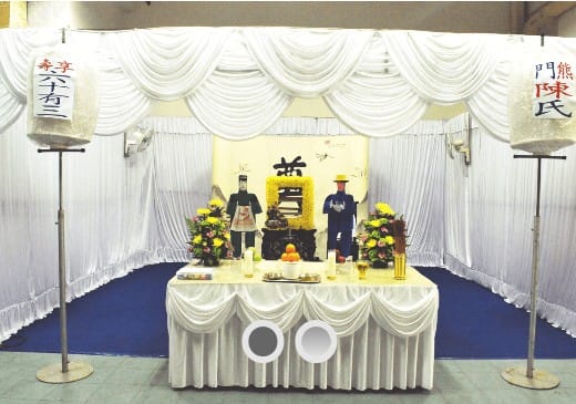 Elaborate Taoist funeral wake at HDB void deck managed by Ang Chin Moh Funeral Directors.