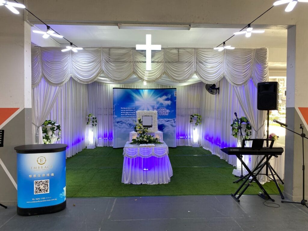 Elegant Christian funeral service at a parlor with high-end floral styling by Embrace.