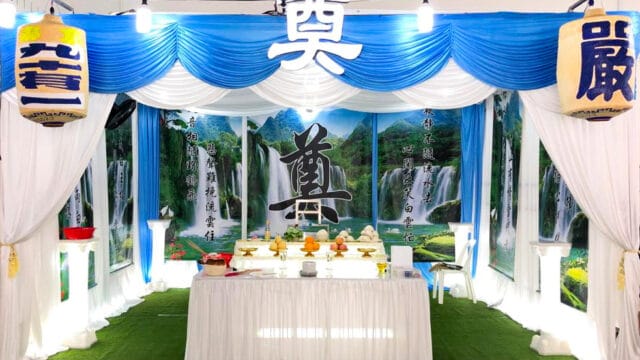 Elaborate Taoist funeral wake at HDB void deck managed by Embrace Funeral Directors.