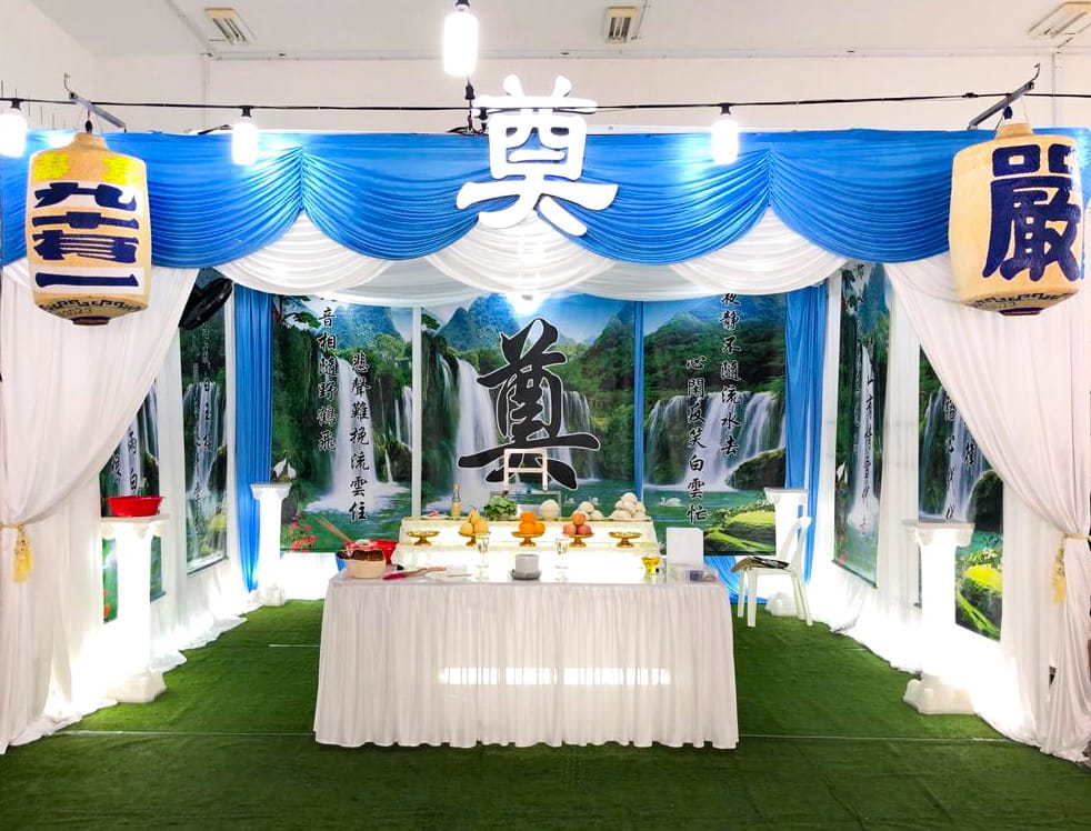 Elaborate Taoist funeral wake at HDB void deck managed by Embrace Funeral Directors.