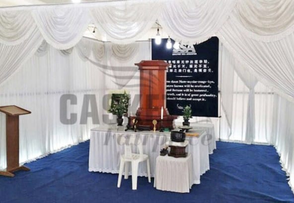 Soka memorial setup by Casket Fairprice featuring personalized photo displays.