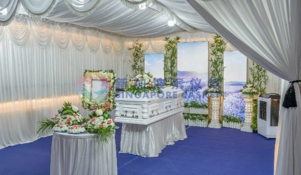 Secular freethinker funeral setup at Singapore Casket with a garden-themed backdrop.