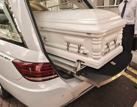 Direct cremation casket and hearse service by White Lilies Funeral