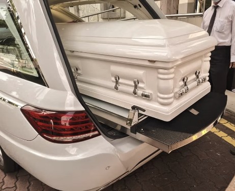 Direct cremation casket and hearse service by White Lilies Funeral