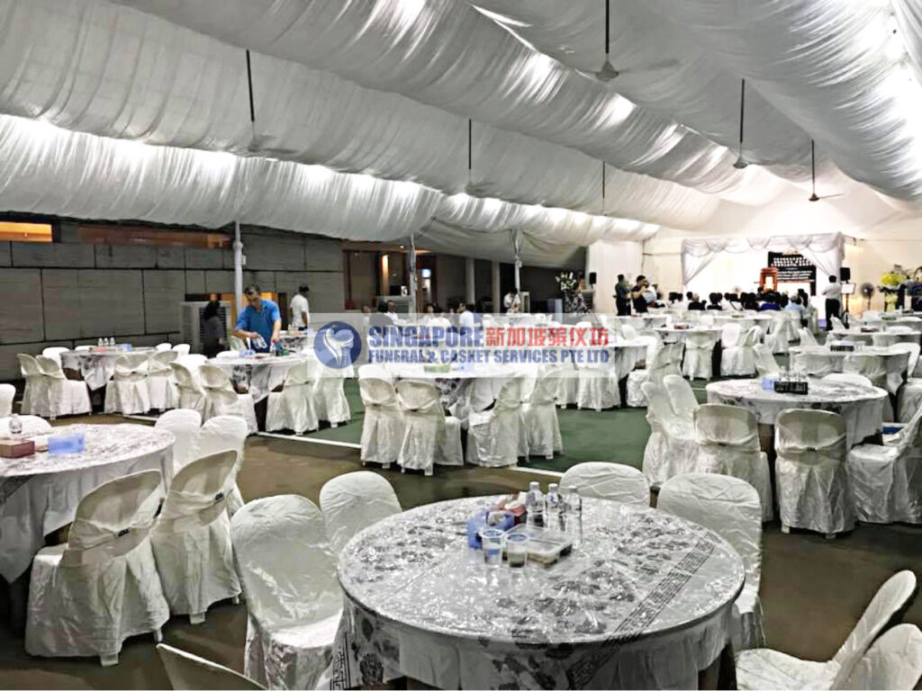 Soka funeral wake setup by Singapore Funeral & Casket Services with banquet-style seating