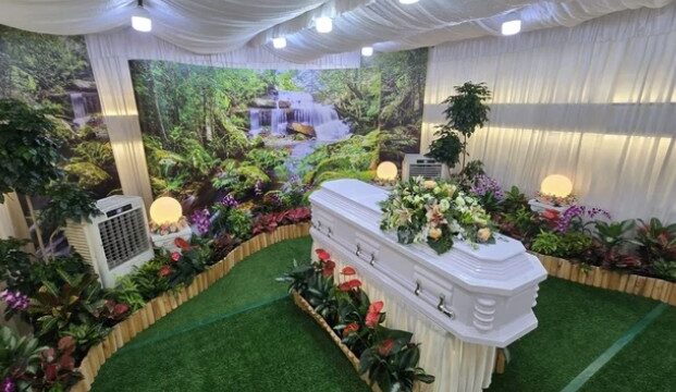 Freethinker funeral wake setup by Unity Casket with simple non-religious altar arrangement in Singapore